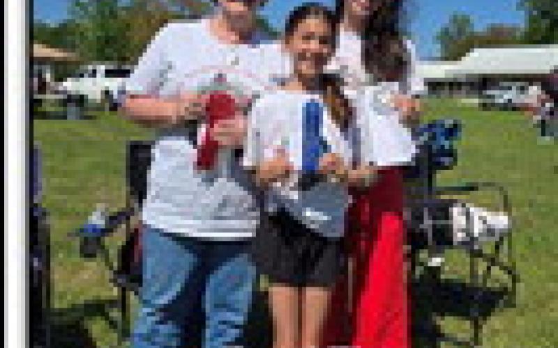 At left, three generations of Dufreche ladies placed in the bake-off at the Julian Dufreche Strawberry Day in the Park. From left, Janet Dufreche won 2nd place in cakes; Lena DePaula won 1st place in the 6th-8th grade competition; and Julianna DePaula won 3rd place in cakes.