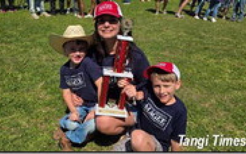 At right, the winner in the wing cookoff at the Julian Dufreche Strawberry Day in the Park was Lind on Bennett Magee for District Court Judge.