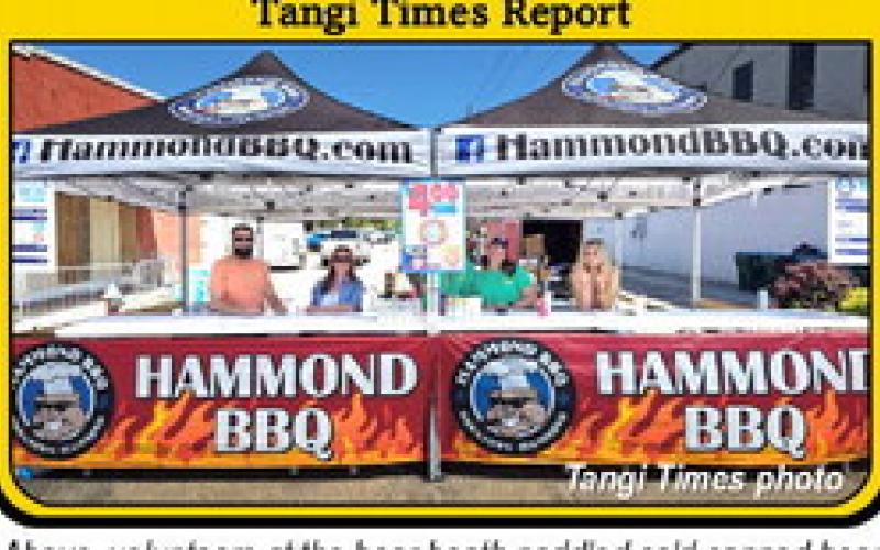 Above, volunteers at the beer booth peddled cold canned beer and rang the tip bell at the annual Hammond BBQ fundraiser, which supports the Richard Murphy Hospice Foundation. Tangi Times was a proud sponsor of the event.