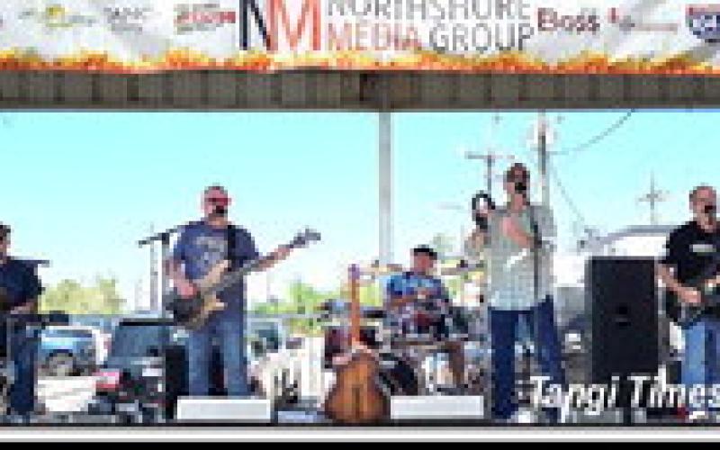 At left, the Open Range Band played at Hammond BBQ on Saturday. Friday’s entertainment was provided by 3rd Street band.