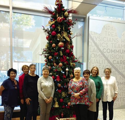 Gardenettes gathered to decorate the tree in the lobby at North Oaks Medical hospital. Participating were Vicky Fannaly, Carol McGough, Cricket Ayala, Sandy Cusick, Susan Pizani, Karen Hotard, Cynthia Cummer, and Jamie LeBlanc. (Courtesy Photo)