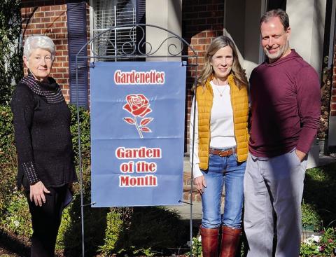 Gardenette chairman Margaret Bailey presents January Garden of the Month honors to Mary and Jay Ransom for their residential landscaping (Courtesy Photo)