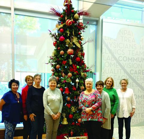 Gardenettes gathered to decorate the tree in the lobby at North Oaks Medical hospital. Participating were Vicky Fannaly, Carol McGough, Cricket Ayala, Sandy Cusick, Susan Pizani, Karen Hotard, Cynthia Cummer, and Jamie LeBlanc. (Courtesy Photo)