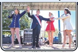 Parade Grand Marshal, 101-year-old George Van Zandt, is serenaded by the Victory Belles on stage in Ponchatoula’s Memorial Park.