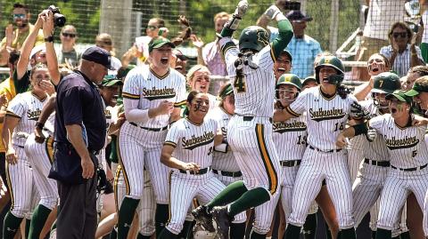 Lexi Johnson and teammates celebrate her walk-off homerun, which sealed the title for SLU’s diamond girls. (Photo courtesy of Arief Harlan)