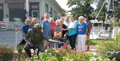 Left to right: Virginia Hawkins, Mary Hirsch, Vincent Thibodaux, Lark Thibodaux, Jim Perrin, Marilyn Wright, Glenn Drude, Bart Migues, Cricket Ayala, Margaret Bailey, and Dale Tate (Courtesy Photo)