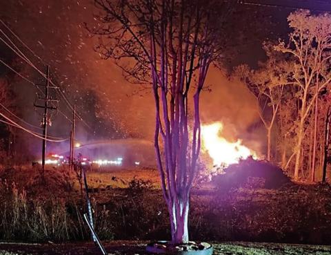 PFD engines combat a timber fire from Hwy 51 on Thursday night. (Courtesy Photo)