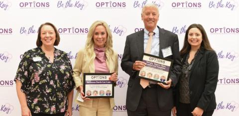 From Left to Right: Carrie Mercke, OPTIONS President and CEO; Rebecca Davis Lee and Gary Gambel, Event Sponsors; and Casey Rudolph, OPTIONS Development Director. ( Courtesy Photo)
