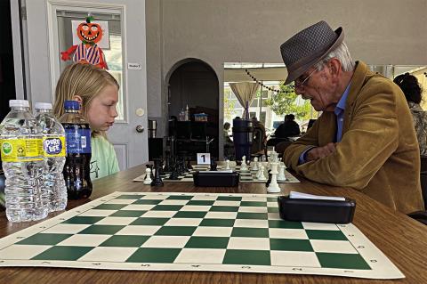 “Prince of the Park” winner, Pete Danker (right), and second place winner, Kai Fleener (left), match wits during Saturday’s tournament. (Coutersy Photo)