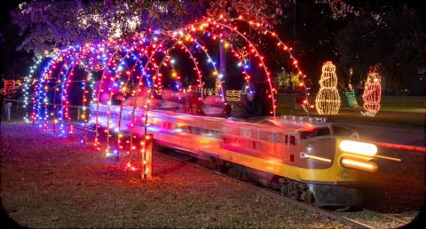 Children experience the joy and wonder of the yuletide spirit on a brisk train ride through Zemurray Park in Hammond. The city’s park was transformed into a beautiful Christmas wonderland to celebrate the joyous holiday season.