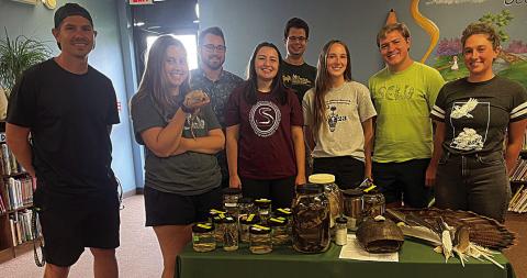 (Tangi Times Photo) Front row, left to right: Anthony Johnson (Stress physiology, Landscape ecology), Emily Vanaselja (Environmental DNA, Ichthyology), Maggie Keller (Herpetology, Ecology, Animal Behavior), Lani Milstead (Alligator Endocrine Physiology), Jacob Barthemey (Evolution, Development, Diversification), Wray Gabel (GIS, Ornithology) Back row left to right: Dr. Tyler Coleman (Quantitative ecology, Data Science), Dr. Alex Mott (Invertebrate ecology)