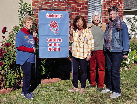 Gardenettes presented the November Garden of the Month award to Lillian Cameron. Shown from left to right are Marilyn Wright, Lillian Cameron (homeowner), Margaret Bailey, and Cricket Ayala. Courtesy Photo