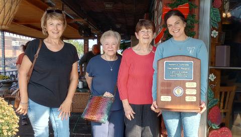 Becky Smith, owner of Paul’s Cafe, received the Genesis Award for civic beautification from Gardenettes for the months of November-December. Pictured are garden club chairman Darnell Kimber, Linda Fabre, Karen Hotard, and recipient Smith.