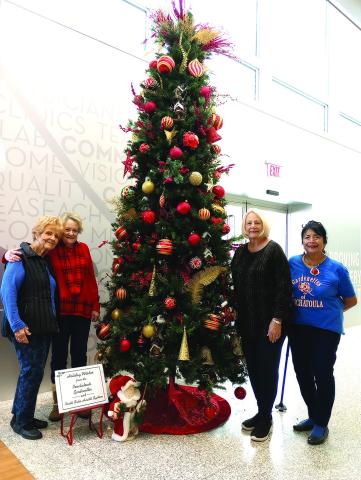 Gardenettes met at North Oaks Medical Center to decorate the main hospital entrance and emergency room lobby. The garden club decorates two trees each holiday season and has participated in this annual event for many holidays. Decking the halls at North Oaks Hospital main lobby and Emergency Room lobby are Gardenettes, Marilyn Wright, Jamie Leblanc, Kathy Bruce and Vicky Fannaly. (Courtesy Photo)