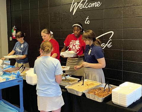 Students at Ponchatoula High School prepare to serve lunch to teachers last Friday (Tangi Times Photo)