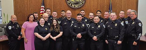 Chief Edwin Bergeron, Jr. (left) and members of his administration stand with fifteen newly sworn-in Hammond Police Officers (Tangi Times Photo)