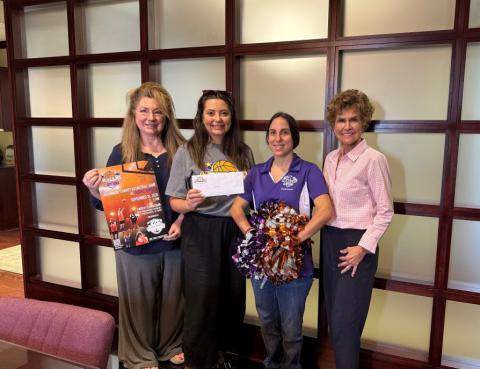 (L to R): Stacy Hoover, Hoover Family Foundation, Casey Rudolph, OPTIONS Development Director, Calin Ardoin, Ballin’4 OPTIONS Cheerleader, and Peggy Hoover, Hoover Family Foundation. (Courtesy photo)