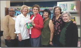 Shown are Librarian Wanda Davis, garden club chairman Carolyn Todd, Author Martin, Vicky Fannaly, President Sandy Grimm, and Rose Doles. (Courtesy Photo)