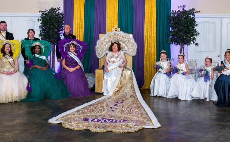 Omega XXXVIII Royal Court, left to right: Teen Princess Janae Feimster, Teen Princess Gracie Coyne, Gold Duke Eddie Lamparski, Gold Maid Baily Gordon, Green Duke Curt Zeller, Sr, Green Maid Keysha Robinson, Purple Duke Rodney Randall, Purple Maid Barbe Castjohn, Omega XXXVIII Queen Christina Larkin, Jr Princess Chevie Lamparski, Jr Princess Lylah Gordon, Jr Princess Clarke Gordon, Jr Princess Jade Williams-Dyson, Jr Princess Jackson Simon, and Jr Princess Ayva Bankston