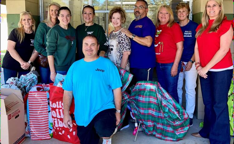 P-Town Jeepers Jeep Club shared the true spirit of Christmas by adopting 24 DC Reeves Elementary School students.