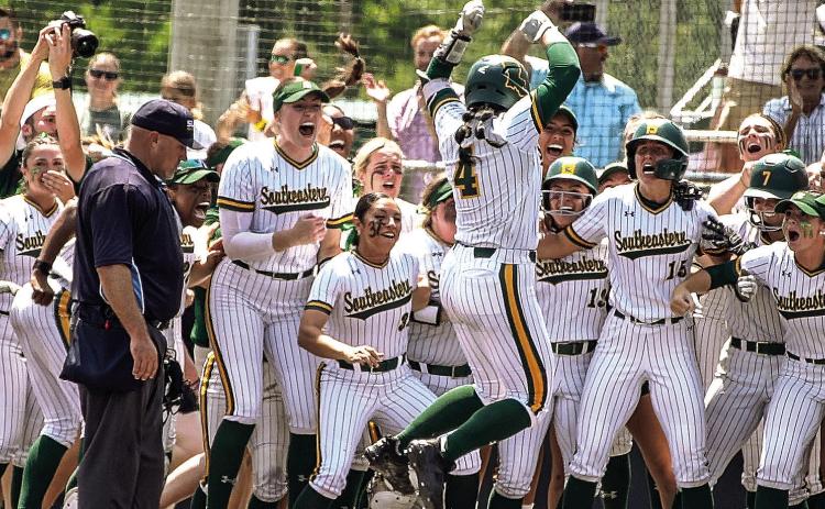 Lexi Johnson and teammates celebrate her walk-off homerun, which sealed the title for SLU’s diamond girls. (Photo courtesy of Arief Harlan)