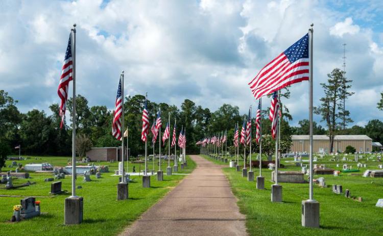 American flags in Ponchatoula Cemetery were raised at 8:00am and lowered at 5:00pm by American Legion Post 47 on Independence Day.