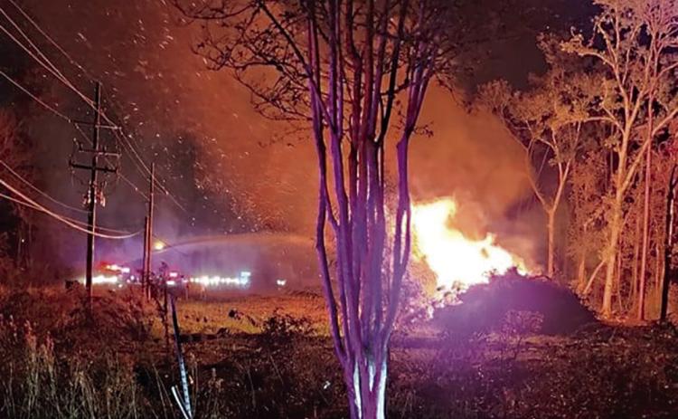 PFD engines combat a timber fire from Hwy 51 on Thursday night. (Courtesy Photo)
