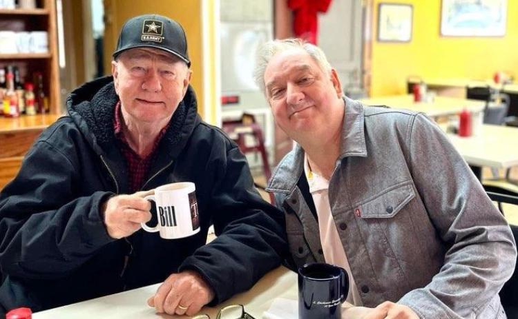 At right, former Café owner Bill Parsons and current owner John Miller meet for coffee and conversation in The Café prior to the October 12 fire that substantially damaged the restaurant.