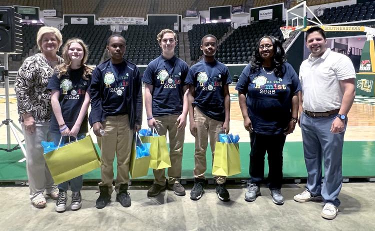 Second Place Lucille Nesom Memorial School team poses with School Board member Joey Piazza (left) and School Superintendent Melissa Stilley (right) (Courtesy Photo)