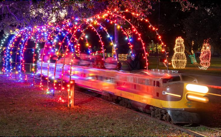Children experience the joy and wonder of the yuletide spirit on a brisk train ride through Zemurray Park in Hammond. The city’s park was transformed into a beautiful Christmas wonderland to celebrate the joyous holiday season.