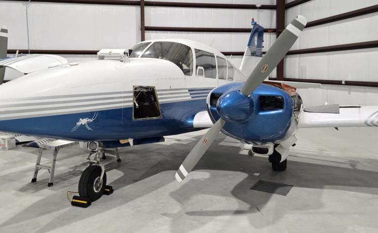 The Tangipahoa Mosquito Abatement District’s Piper Aztec makes itself at home in its new hangar at the Northshore Regional Airport