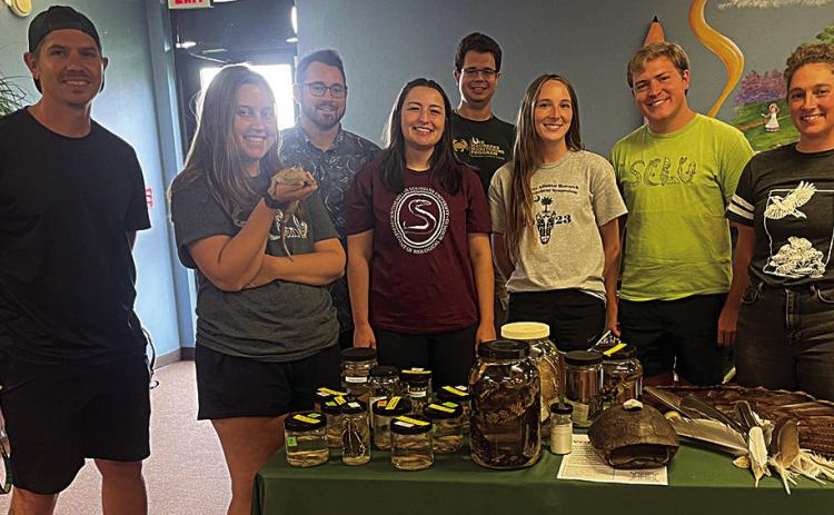 (Tangi Times Photo) Front row, left to right: Anthony Johnson (Stress physiology, Landscape ecology), Emily Vanaselja (Environmental DNA, Ichthyology), Maggie Keller (Herpetology, Ecology, Animal Behavior), Lani Milstead (Alligator Endocrine Physiology), Jacob Barthemey (Evolution, Development, Diversification), Wray Gabel (GIS, Ornithology) Back row left to right: Dr. Tyler Coleman (Quantitative ecology, Data Science), Dr. Alex Mott (Invertebrate ecology)