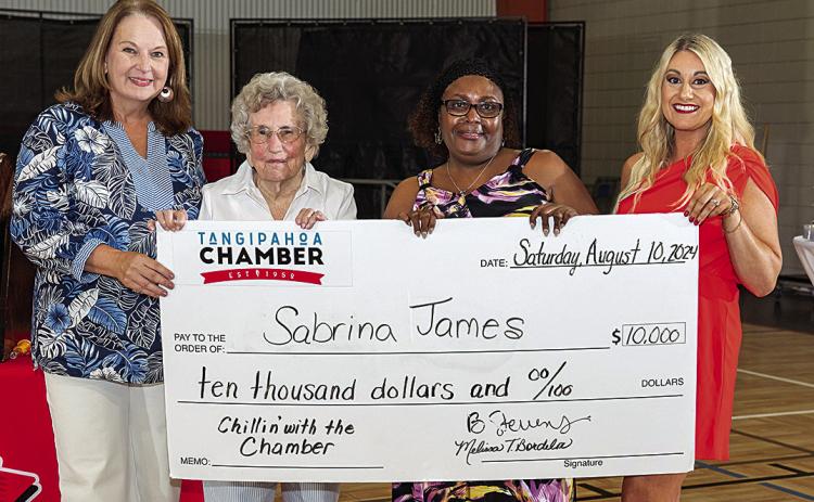 Pictured from left to right are Tangipahoa Chamber’s President and CEO, Melissa Bordelon; Tangipahoa Chamber’s #1 Ticket Seller, Frances Chauvin; winner of the $10,000 grand prize, Sabrina James; and Chairman of the Tangipahoa Chamber Board of Directors, Brandi Stevens. $10,000 Winner (All Photos Courtesy of Phillip Colwart Photography)