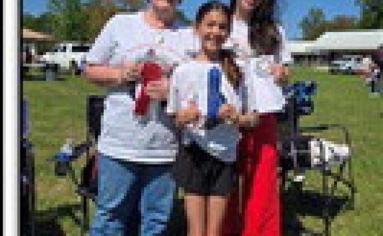 At left, three generations of Dufreche ladies placed in the bake-off at the Julian Dufreche Strawberry Day in the Park. From left, Janet Dufreche won 2nd place in cakes; Lena DePaula won 1st place in the 6th-8th grade competition; and Julianna DePaula won 3rd place in cakes.