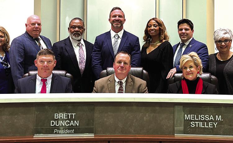 The 2024 Tangipahoa Parish School Board poses for their annual photo. Shown are (front row) Vice President Tom Tolar, President Brett Duncan, and Superintendent Melissa Stilley; (back row) Rose Dominguez, Glenn Westmoreland, Jerry Moore, Trent Anthony, Janice Richards, Joey Piazza, and Robin Abrams. (Courtesy Photo)