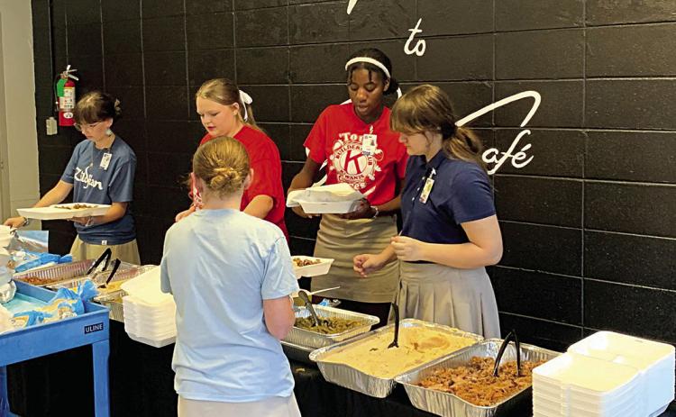 Students at Ponchatoula High School prepare to serve lunch to teachers last Friday (Tangi Times Photo)