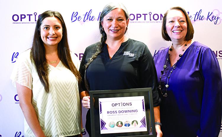 Pictured left to right: Casey Rudolph, OPTIONS Development Director; Andrea Arnold, Ross Downing Business Development Director; and Carrie Mercke, OPTIONS President/CEO