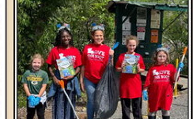Members of Troop 30017 of Ponchatoula at the Joyce Wildlife Swampwalk for Love the Boot cleanup