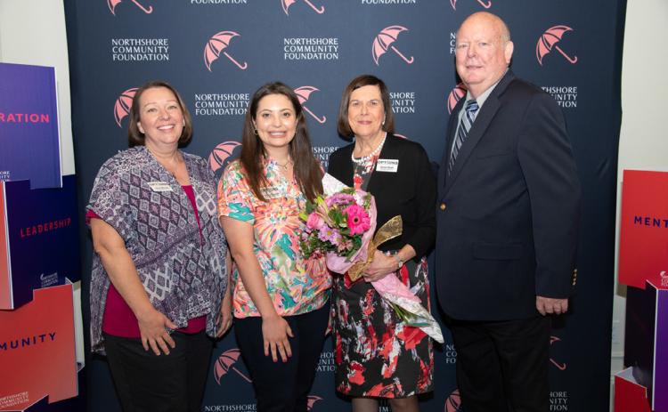 Pictured left to right: Carrie Mercke, OPTIONS President and CEO; Casey Rudolph, OPTIONS Development Director; Sylvia Bush, OPTIONS President Emeritus; and Ernie Bush, husband of Sylvia Bush (Courtesy Photo)